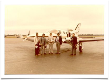 With board members in Canada